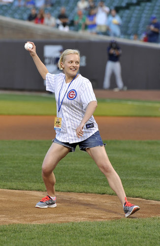 Elisabeth Moss threw out the first pitch for the Chicago Cubs in August 2012.
Elisabeth Moss threw out the first pitch for the Chicago Cubs in August 2012.