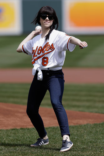 Carly Rae Jepsen tied up her Baltimore Orioles jersey for the first pitch in April.
Carly Rae Jepsen tied up her Baltimore Orioles jersey for the first pitch in April.