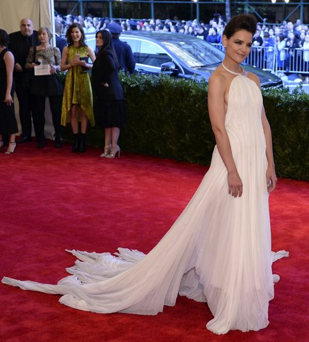 Katie Holmes was ethereal in a white chiffon Calvin Klein Collection halter gown and Lorraine Schwartz jewels.
Katie Holmes was ethereal in a white chiffon Calvin Klein Collection halter gown and Lorraine Schwartz jewels.