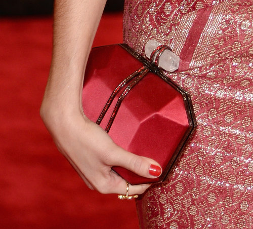 Nora Zehetner carried a fun-shaped, red satin clutch.
Nora Zehetner carried a fun-shaped, red satin clutch.