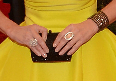 Joely Richardson wore silver- and gold-toned jewelry and carried a black clutch.
Joely Richardson wore silver- and gold-toned jewelry and carried a black clutch.