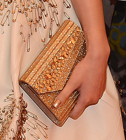 Hailee Steinfeld carried a Jimmy Choo clutch.
Hailee Steinfeld carried a Jimmy Choo clutch.