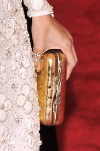 Nicole Richie brought a House of Harlow 1960 clutch and Maria Francesca Pepe ring.
Nicole Richie brought a House of Harlow 1960 clutch and Maria Francesca Pepe ring.