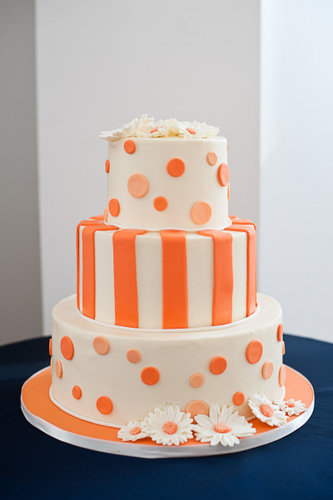 Modern meets mod in a playful orange cake.
Photo by Betsy Wall Photography via Style Me Pretty
Modern meets mod in a playful orange cake.
Photo by Betsy Wall Photography via Style Me Pretty