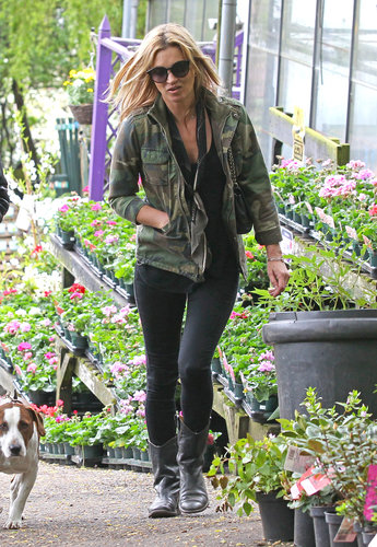 Kate Moss balanced a cool camouflage jacket with black basics while walking her dog in London.
Kate Moss balanced a cool camouflage jacket with black basics while walking her dog in London.