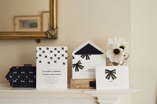 These bow invitations (prices vary) are a cute play on "tying the knot." We love the sleek black-and-white combination, especially if you want to set the tone for a more modern celebration.
These bow invitations (prices vary) are a cute play on "tying the knot." We love the sleek black-and-white combination, especially if you want to set the tone for a more modern celebration.