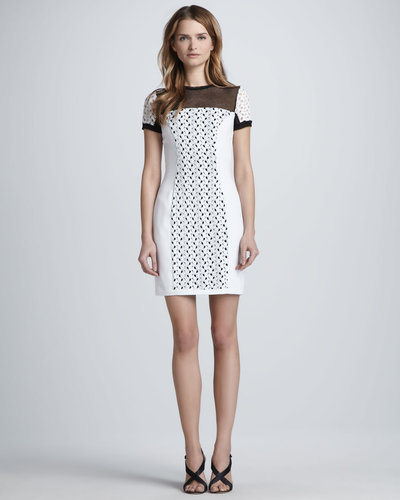 A sexy sheath is sweetened with crocheted lace and short sleeves. The nice-but-naughty vibe makes this Black Halo style ($375) a fit for both a work meeting and a dinner date.
A sexy sheath is sweetened with crocheted lace and short sleeves. The nice-but-naughty vibe makes this Black Halo style ($375) a fit for both a work meeting and a dinner date.