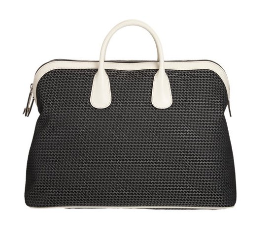 Valextra's logo-stitched medium duffel ($2,430) has a sporty shape — we love the rolled top handles! — with a sophisticated color palette.
Valextra's logo-stitched medium duffel ($2,430) has a sporty shape — we love the rolled top handles! — with a sophisticated color palette.