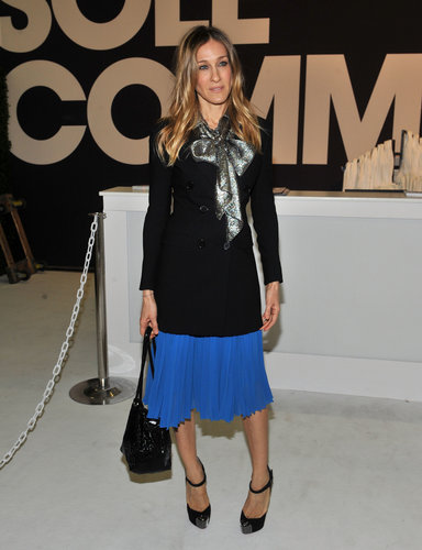 We love the combination of SJP's pleated cobalt skirt, metallic bow-tie blouse, and ankle-strap pumps at the ENK Fashion Coterie in February 2011.
We love the combination of SJP's pleated cobalt skirt, metallic bow-tie blouse, and ankle-strap pumps at the ENK Fashion Coterie in February 2011.