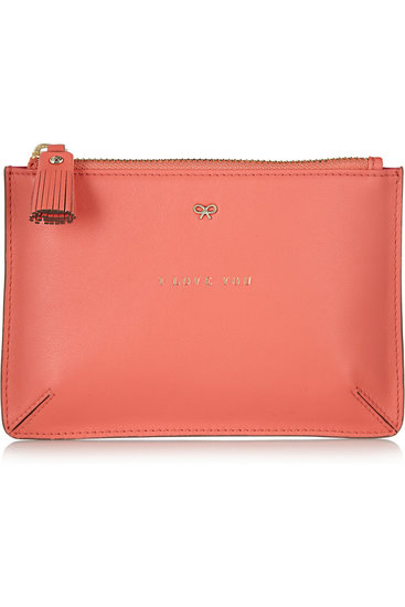 There's no such thing as too many zippered pouches! This Anya Hindmarch pick ($195) is perfect for wrangling loose change, gum, or building passes. The sweet musing on the front is just a little bonus.
There's no such thing as too many zippered pouches! This Anya Hindmarch pick ($195) is perfect for wrangling loose change, gum, or building passes. The sweet musing on the front is just a little bonus.