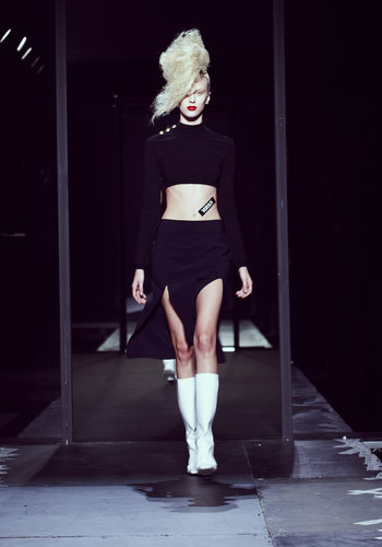 Before the show started, all the guests assembled around a massive black box in the middle of the room. When illuminated, the box was revealed to be a backstage area enclosed by translucent panels of plastic. From there, models walked down runways on either side of the space before performances by musicians Angel Haze, Dead Sara, and Grimes.
And while no one walked away with pieces from the collection, guests did get a special treat at the end of the party: a parcel of differently flavored doughnut holes served as the goody bag.
Photo courtesy of Versace
Before the show started, all the guests assembled around a massive black box in the middle of the room. When illuminated, the box was revealed to be a backstage area enclosed by translucent panels of plastic. From there, models walked down runways on either side of the space before performances by musicians Angel Haze, Dead Sara, and Grimes.
And while no one walked away with pieces from the collection, guests did get a special treat at the end of the party: a parcel of differently flavored doughnut holes served as the goody bag.
Photo courtesy of Versace