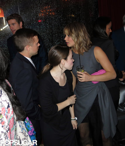 Jennifer Lawrence Stays Glued to Her iPhone at Cannes Catching Fire Bash Jennifer Lawrence Stays Glued to Her iPhone at Cannes Catching Fire Bash