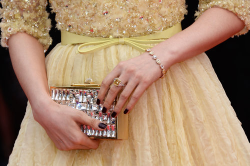 Fan Bingbing carried a crystallized gold clutch and wore yellow diamond jewels by Chopard.
Fan Bingbing carried a crystallized gold clutch and wore yellow diamond jewels by Chopard.