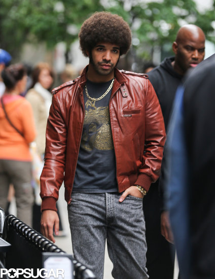 Drake got all kinds of '70s with an afro.
Drake got all kinds of '70s with an afro.