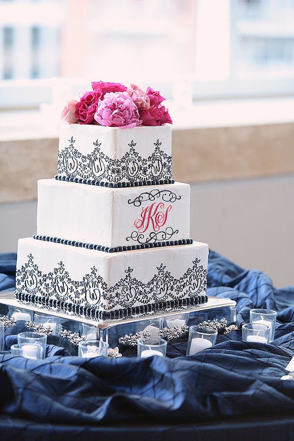 The whimsical black trim, the pink peonies, the personalized initials — so much about this cake screams "romantic."
Photo by Kristin Vining Photography via Style Me Pretty
The whimsical black trim, the pink peonies, the personalized initials — so much about this cake screams "romantic."
Photo by Kristin Vining Photography via Style Me Pretty