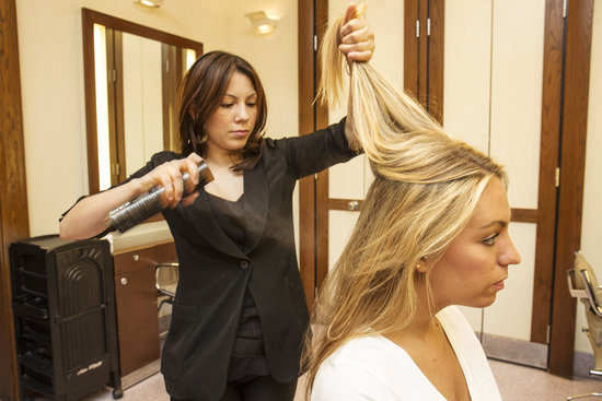 If you're starting off on straight hair (or just want the perfect beach waves), apply a flexible-hold hair spray to your layers before running a curling iron through your hair. This step helps your hair not only hold the style, but also helps with frizz.
If you're starting off on straight hair (or just want the perfect beach waves), apply a flexible-hold hair spray to your layers before running a curling iron through your hair. This step helps your hair not only hold the style, but also helps with frizz.
