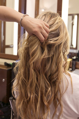 Once the waves have set, run your fingers through them to get the optimal beachy texture to complement your braids.
Once the waves have set, run your fingers through them to get the optimal beachy texture to complement your braids.