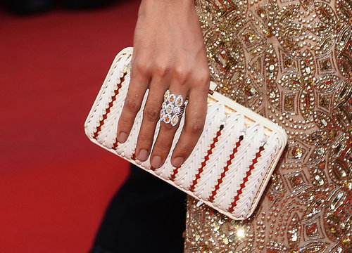 Rosario Dawson carried a white Ferragamo clutch.
Rosario Dawson carried a white Ferragamo clutch.