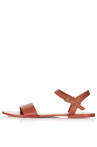 If your closet doesn't already include at least one wear-with-everything leather flat, scoop up this Topshop style ($36) immediately.
If your closet doesn't already include at least one wear-with-everything leather flat, scoop up this Topshop style ($36) immediately.