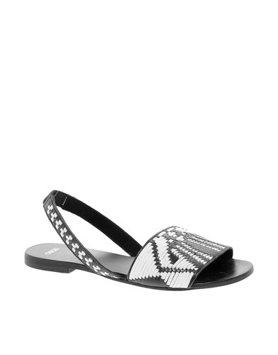 Have some fun with patterns like this graphic black and white ASOS sling-back ($44).
Have some fun with patterns like this graphic black and white ASOS sling-back ($44).