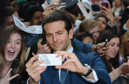 Bradley Cooper snapped a shot of himself with fans at the London premiere of The Hangover Part III in May 2013.
Bradley Cooper snapped a shot of himself with fans at the London premiere of The Hangover Part III in May 2013.