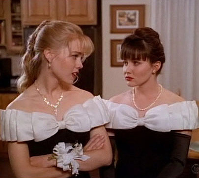 Kelly and Brenda fume because they both wore the same dress. At least their hair was different.
Kelly and Brenda fume because they both wore the same dress. At least their hair was different.