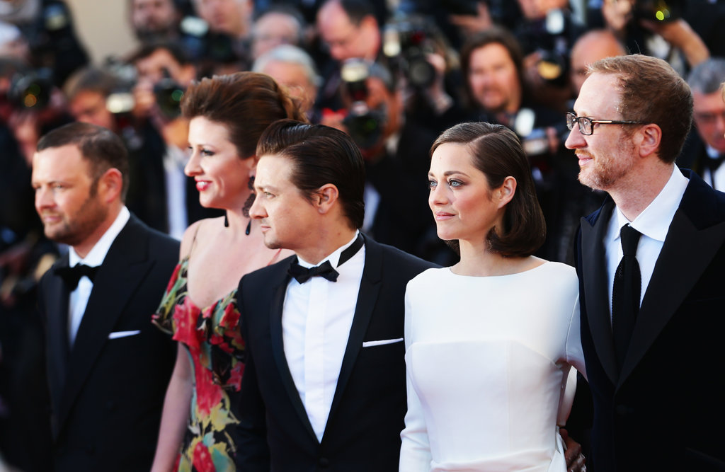 Jeremy Renner and Marion Cotillard stopped for pictures with James Gray before the premiere for The Immigrant on Friday.
Jeremy Renner and Marion Cotillard stopped for pictures with James Gray before the premiere for The Immigrant on Friday.