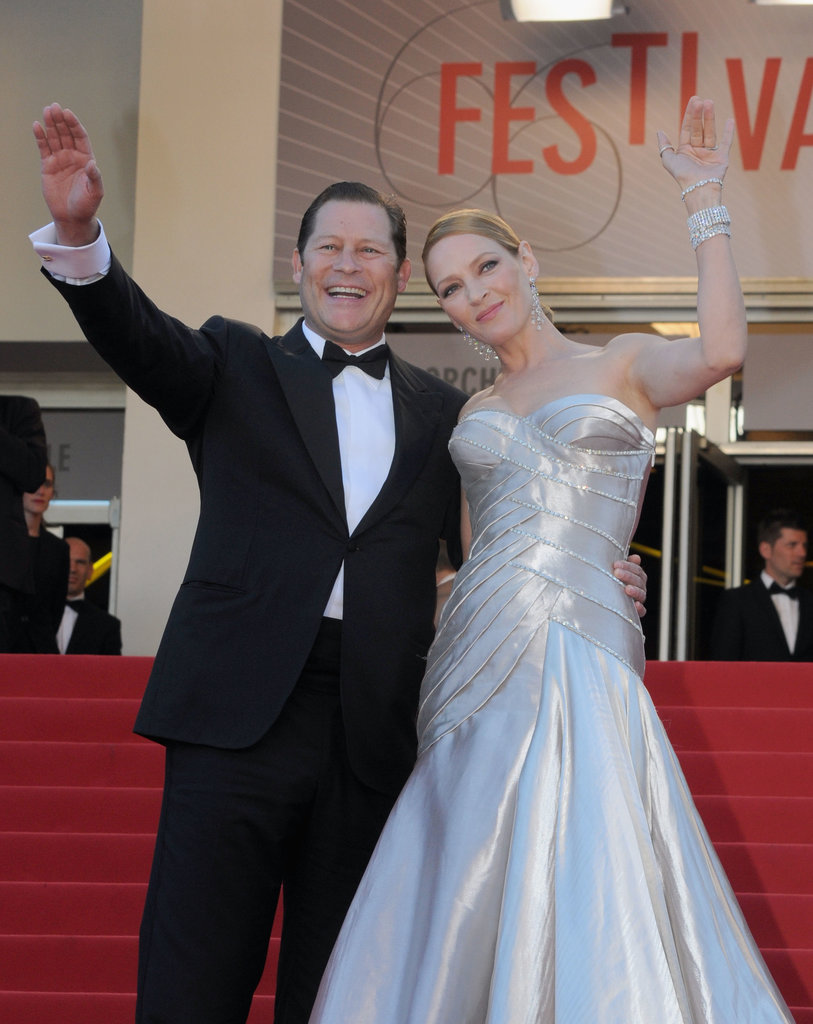 Uma Thurman and Arpad Busson waved to the crowd on Sunday before the Zulu premiere.
Uma Thurman and Arpad Busson waved to the crowd on Sunday before the Zulu premiere.