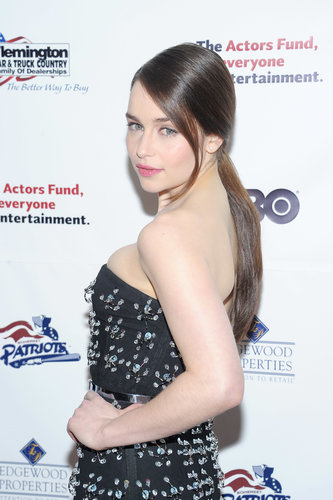 Using a shine hair serum is the best way to get the high-shine finish of Emilia Clarke's ponytail at the Actors Fund Gala.
Using a shine hair serum is the best way to get the high-shine finish of Emilia Clarke's ponytail at the Actors Fund Gala.