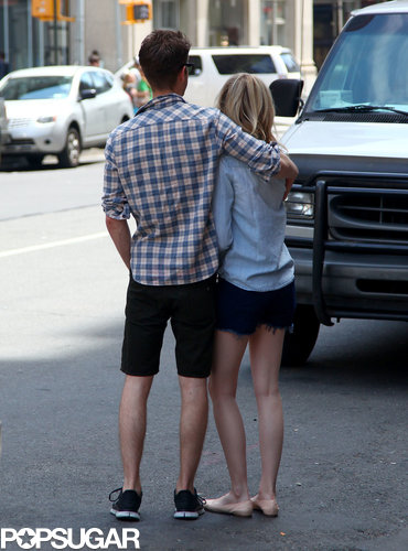 The couple cuddled up on a New York City street.
The couple cuddled up on a New York City street.