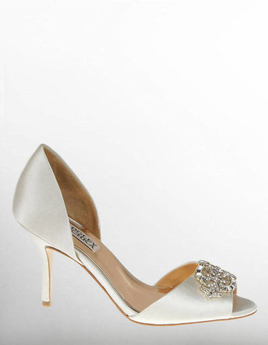 These Badgley Mischka jeweled peep-toe pumps ($150, originally $215) are made for the bride who wants to look traditional without sacrificing comfort — or pizzazz.
These Badgley Mischka jeweled peep-toe pumps ($150, originally $215) are made for the bride who wants to look traditional without sacrificing comfort — or pizzazz.