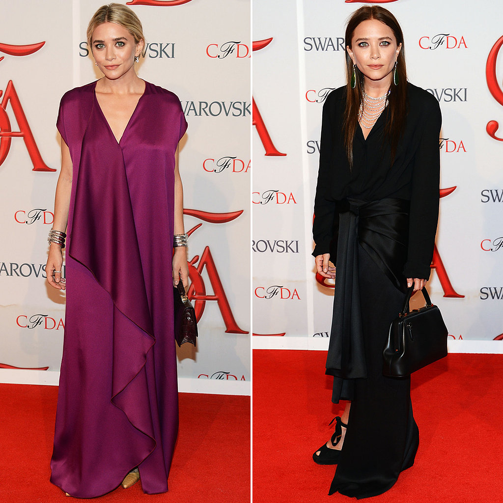 Twinning combo: The designing sisters celebrated their 2012 CFDA Womenswear Designer of the Year Award in rich hues and silky silhouettes, both by The Row.
Ashley pumped up the color in a deep fuchsia gown with cascading front-ruffle detail and a no-fuss updo.
Mary-Kate went for a darker look, owning a black long-sleeved silk dress with a high-low hem, then slipping on dazzling diamond drop earrings for a pop of shine.
Twinning combo: The designing sisters celebrated their 2012 CFDA Womenswear Designer of the Year Award in rich hues and silky silhouettes, both by The Row.
Ashley pumped up the color in a deep fuchsia gown with cascading front-ruffle detail and a no-fuss updo.
Mary-Kate went for a darker look, owning a black long-sleeved silk dress with a high-low hem, then slipping on dazzling diamond drop earrings for a pop of shine.