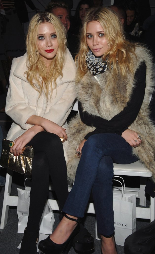 Twinning combo: The girls sat front row at the Jenni Kayne Fall 2007 show donning plush fur outerwear.
Mary-Kate styled her rich cream-colored coat with black leggings and chunky ankle boots.
Ashley showed her support for Jenni Kayne donning a lavish fur vest from her collection with true-blue denim and ankle-strap pumps.
Twinning combo: The girls sat front row at the Jenni Kayne Fall 2007 show donning plush fur outerwear.
Mary-Kate styled her rich cream-colored coat with black leggings and chunky ankle boots.
Ashley showed her support for Jenni Kayne donning a lavish fur vest from her collection with true-blue denim and ankle-strap pumps.