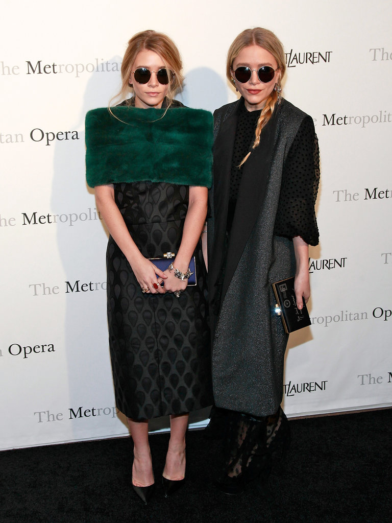 Twinning combo: So bright, they've gotta wear shades. Ashley and Mary-Kate accessorized their March 2011 Metropolitan Opera looks with matching oversize round sunglasses.
Ashley kept cozy in an emerald-green fur stole over her jacquard sheath dress.
Mary-Kate topped her sheer, polka-dot maxi dress with a metallic shawl-collar coat.
Twinning combo: So bright, they've gotta wear shades. Ashley and Mary-Kate accessorized their March 2011 Metropolitan Opera looks with matching oversize round sunglasses.
Ashley kept cozy in an emerald-green fur stole over her jacquard sheath dress.
Mary-Kate topped her sheer, polka-dot maxi dress with a metallic shawl-collar coat.