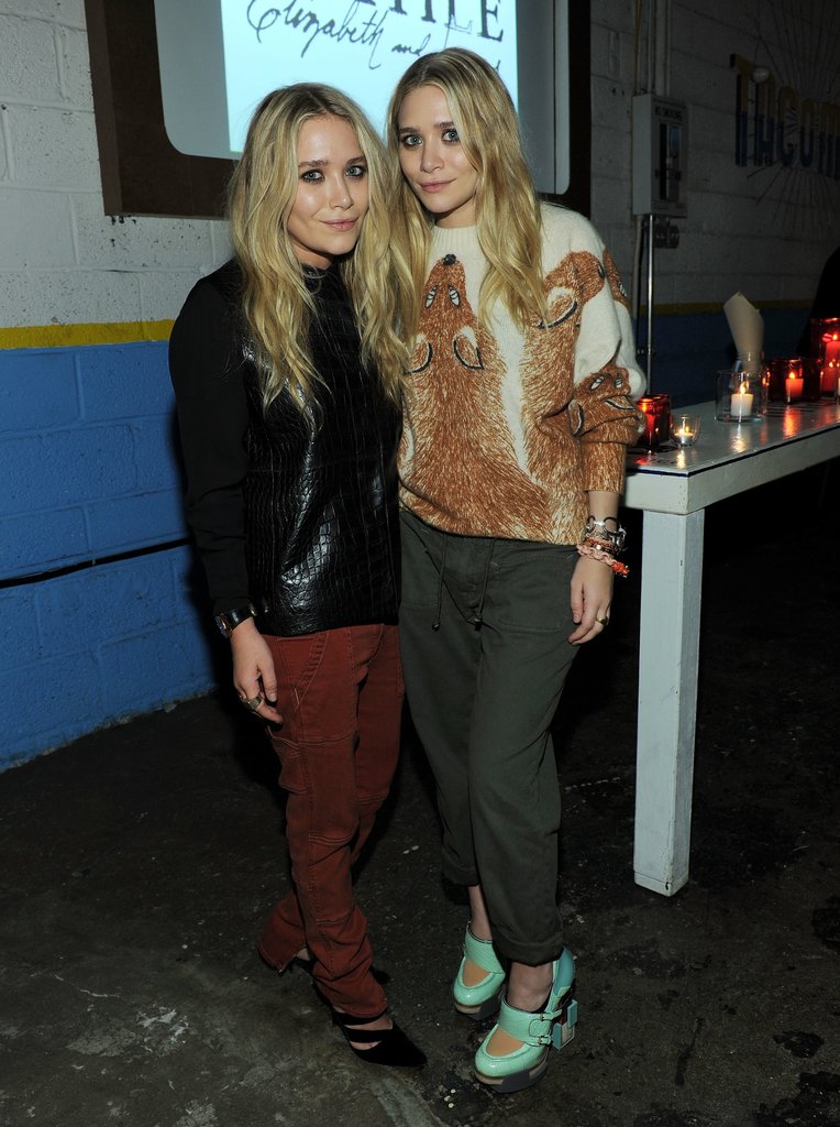 Twinning combo: The twins put their cool-girl spin on cargo pants at a Textile Elizabeth and James celebration in 2011.
Mary-Kate opted for a Fall-friendly palette wearing a black crocodile sweater with rust-hued pants and pointed pumps.
Ashley went cheeky in a fox-print sweater, cuffed army-green pants, and futuristic mint Mary Janes.
Twinning combo: The twins put their cool-girl spin on cargo pants at a Textile Elizabeth and James celebration in 2011.
Mary-Kate opted for a Fall-friendly palette wearing a black crocodile sweater with rust-hued pants and pointed pumps.
Ashley went cheeky in a fox-print sweater, cuffed army-green pants, and futuristic mint Mary Janes.