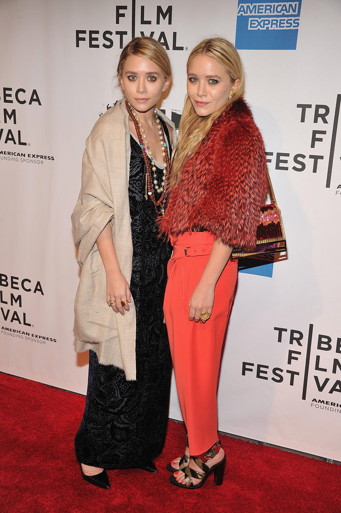 Twinning combo: Proving their expertise in mixing eclectic prints with textures, Mary-Kate and Ashley turned heads at the 2011 Tribeca Film Festival.
Ashley shrugged a burlap-hued shawl over her black-and-silver brocade maxi, then tossed on an array of boho-chic necklaces and rings.
Mary-Kate's love of fur extended with a cropped orange-and-red creation, coordinating trousers, and python sandals.
Twinning combo: Proving their expertise in mixing eclectic prints with textures, Mary-Kate and Ashley turned heads at the 2011 Tribeca Film Festival.
Ashley shrugged a burlap-hued shawl over her black-and-silver brocade maxi, then tossed on an array of boho-chic necklaces and rings.
Mary-Kate's love of fur extended with a cropped orange-and-red creation, coordinating trousers, and python sandals.