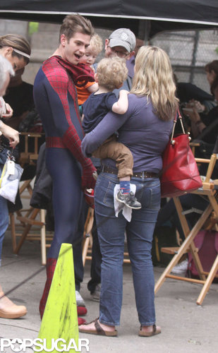 Andrew Garfield took off his mask to greet a young fan on the NYC set.
Andrew Garfield took off his mask to greet a young fan on the NYC set.