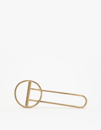 The bottle opener ($80) is elevated to art in handcrafted brass.
The bottle opener ($80) is elevated to art in handcrafted brass.