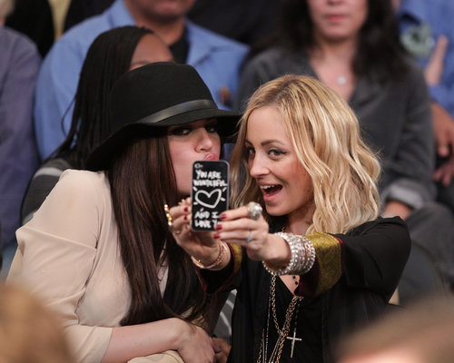 Khloé Kardashian and Nicole Richie took a break from watching a January 2011 Lakers game to pose for a picture courtside.
Khloé Kardashian and Nicole Richie took a break from watching a January 2011 Lakers game to pose for a picture courtside.