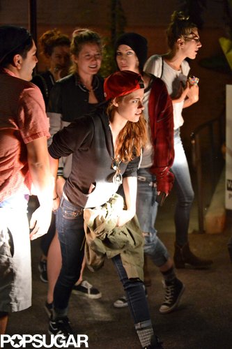 Kristen Stewart wore a red baseball hat.
Kristen Stewart wore a red baseball hat.