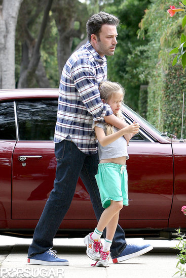 Ben Affleck held on tight to Violet after getting out of their car.
Ben Affleck held on tight to Violet after getting out of their car.