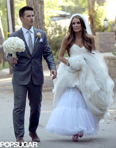 Matt Lanter and Angela Stacy walked together on their wedding day.
Matt Lanter and Angela Stacy walked together on their wedding day.