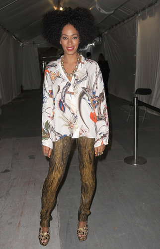 Solange styled her gold-and-black leggings with a floral button-down blouse and cutout leopard sandals during NYFW Spring 2012.
Solange styled her gold-and-black leggings with a floral button-down blouse and cutout leopard sandals during NYFW Spring 2012.