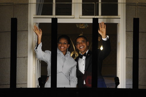 Barack and Michelle Obama waved from a window at Oslo's Grand Hotel in December 2010 after President Obama accepted the Nobel Peace Prize.
Barack and Michelle Obama waved from a window at Oslo's Grand Hotel in December 2010 after President Obama accepted the Nobel Peace Prize.