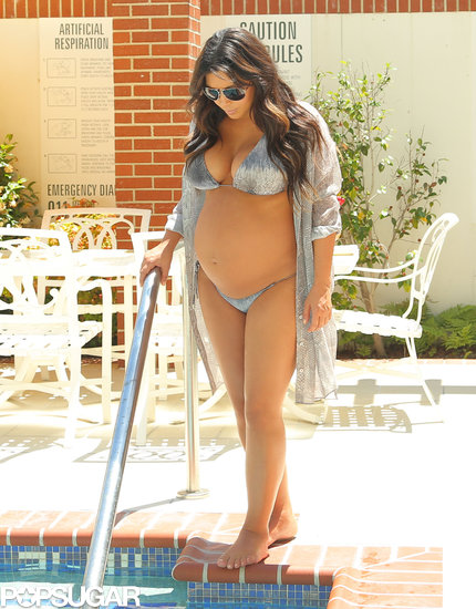 Pregnant Kim Kardashian wore a metallic bikini in LA, just days before she gave birth to daughter North West in June 2013.
Pregnant Kim Kardashian wore a metallic bikini in LA, just days before she gave birth to daughter North West in June 2013.