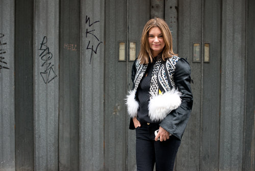 Behold the power of layers. This quirky vest took her black blouse to boho-luxe fashion territory.
Behold the power of layers. This quirky vest took her black blouse to boho-luxe fashion territory.