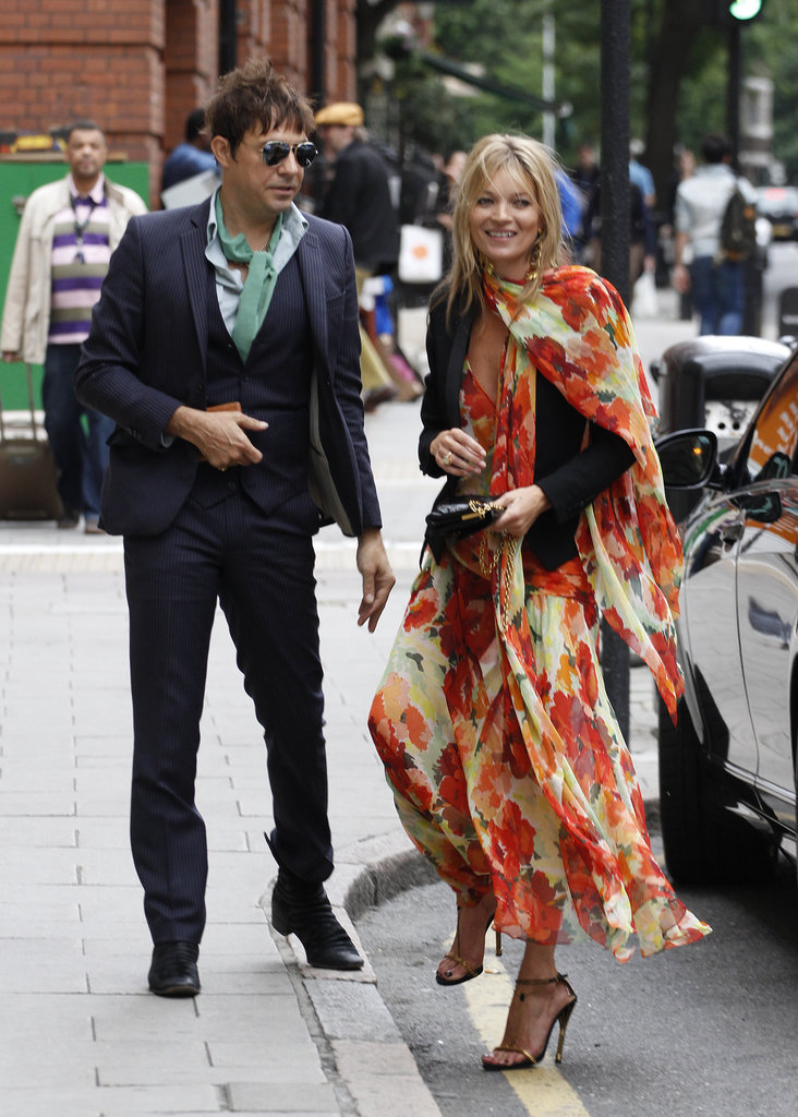 Kate Moss ditched her skinny denim in lieu of a floral maxi dress for a wedding she and husband Jamie Hince attended in London in June. Clearly she can pull off both! To stand out à la Kate, just find a fresh floral dress in punchy hues, and add a black blazer to temper it.
Kate Moss ditched her skinny denim in lieu of a floral maxi dress for a wedding she and husband Jamie Hince attended in London in June. Clearly she can pull off both! To stand out à la Kate, just find a fresh floral dress in punchy hues, and add a black blazer to temper it.