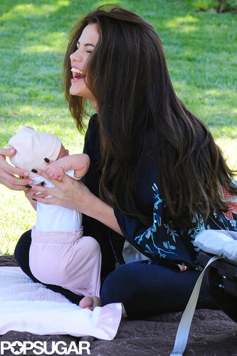 Selena Gomez held her baby sister, Gracie Elliot, in LA.
Selena Gomez held her baby sister, Gracie Elliot, in LA.