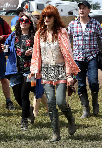 Florence Welch gave her festival look a boho spin, layering loose, flowy pieces.
Florence Welch gave her festival look a boho spin, layering loose, flowy pieces.