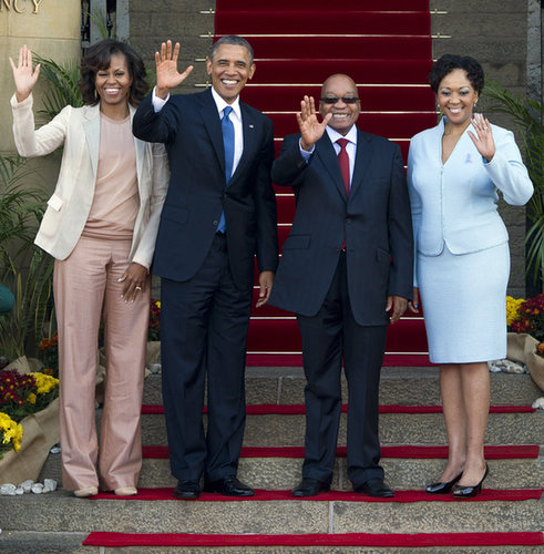 The first lady tried out a more relaxed silhouette as she and President Obama stood alongside South African President Jacob Zuma and his wife Thobeka Madiba-Zuma.
The first lady tried out a more relaxed silhouette as she and President Obama stood alongside South African President Jacob Zuma and his wife Thobeka Madiba-Zuma.